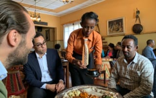 Adiamseged Eyassu, General Manager of Rockstone Ethiopia and Benjam Vetterli, Country Head, Rockstone Ethiopia, share a meal with Dietrich Rogge, Founder of Rockstone